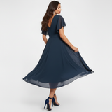 "Clarissa™ Maxi Haljina s V-Izrezom" can be rewritten as "Clarissa™ Maxi Dress with V-Neck".